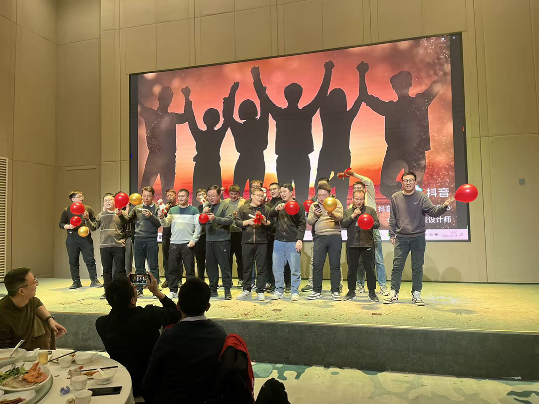 Employees performing during the KINMARK 2025 Annual Gala celebration.